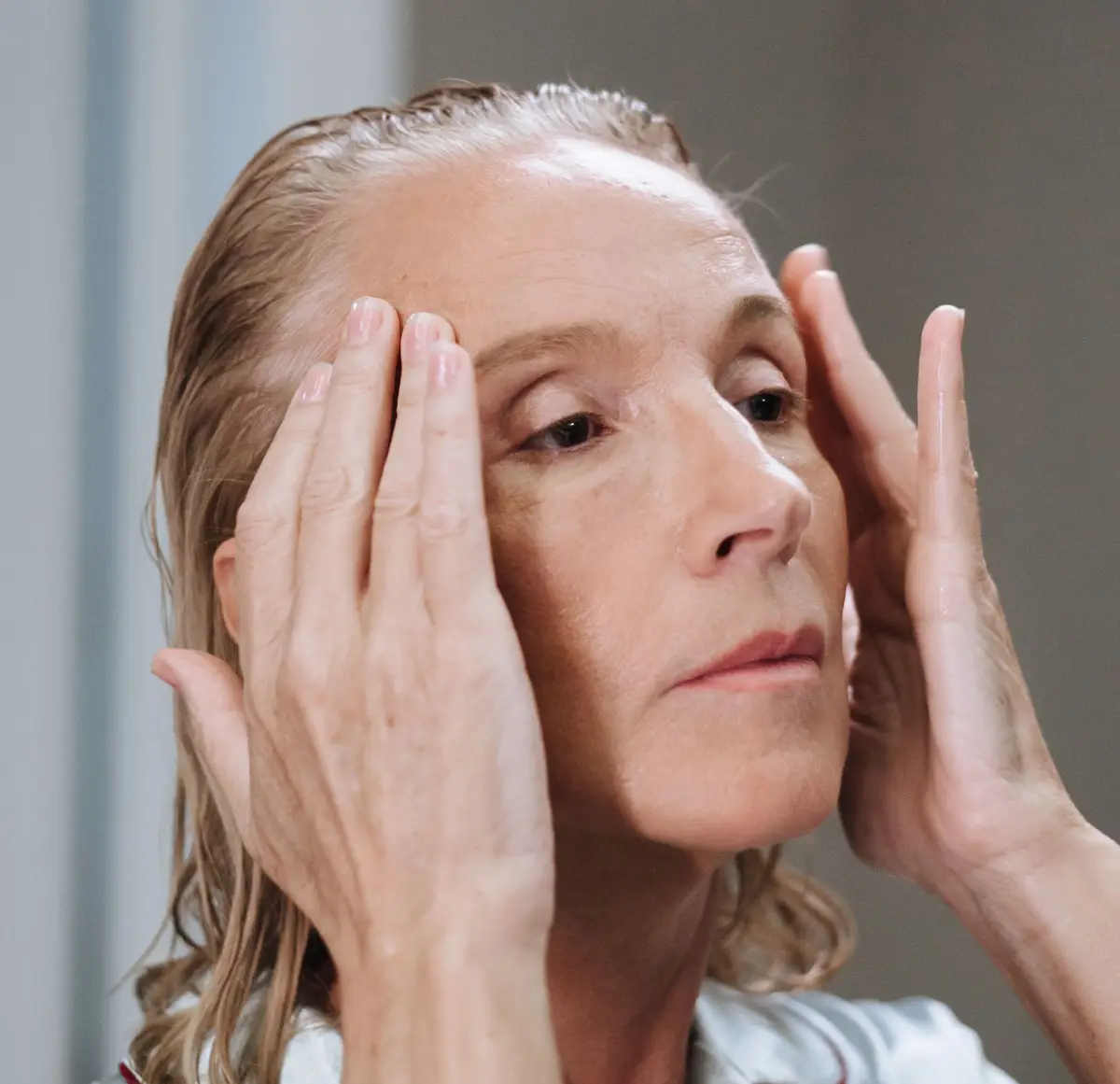 Older woman looking at glabellar lines